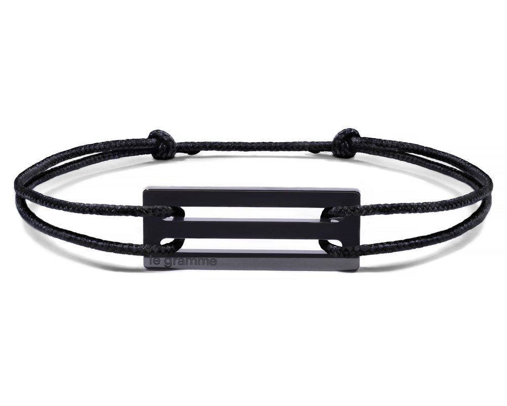 perforated black cord bracelet le 1.7g